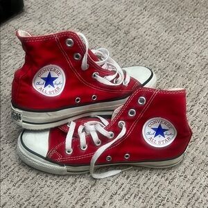 Converse high top red sneakers.